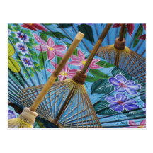 Decorative hand painted umbrellas in the village postcard