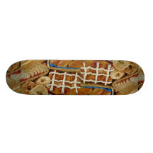 Delicious Baked goods: bagels, rolls, hot crossed Skate Board