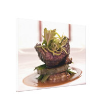 Delicious meat filet with curry leaves canvas prints