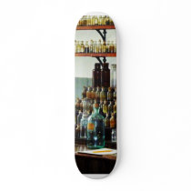 Desk With Bottles of Chemicals Skate Boards
