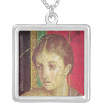 Detail of the head of the Seated Mother Pendants