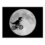 Dinosaur on a Bike In Sky With Moon Post Card