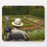Disabled man in wheelchair in garden mousepads
