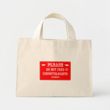 Do Not Feed The Cosmetologists Tote Bags
