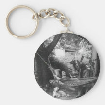 Dog under hammock key chain