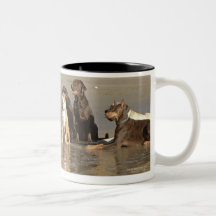 Dogs sitting on beach coffee mug