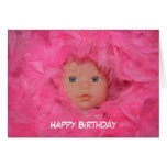 Doll Amongst Pink FeathersHappy Birthday Card