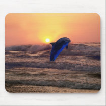 Dolphin at sunset mousepads