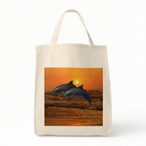 Dolphins at sunset canvas bag
