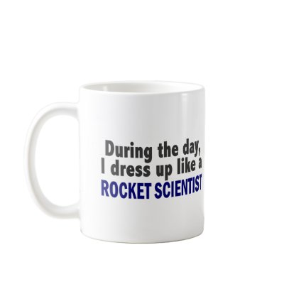 During The Day I Dress Up Like A Rocket Scientist Coffee Mug by professiongifts