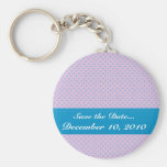 Effective blue flower with sepals on rough pink ba keychains