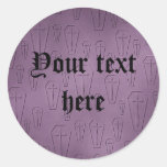 Elegantly embossed gothic coffins in purple round sticker