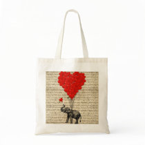 Elephant holding heart shaped balloons bag