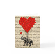 Elephant holding heart shaped balloons greeting card