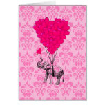 Éléphant tenant le coeur sur la damassé rose carte