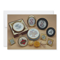 Embroidered miniatures in frames announcements