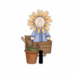 Enfant de fleur dans la brouette de roue photos en relief