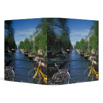 Europe, Holland, Amsterdam, yellow bicycle and 3 Ring Binder