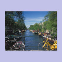 Europe, Holland, Amsterdam, yellow bicycle and postcards