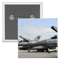 F-16 Fighting Falcons await to launch Button