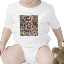 Face In Stone On Buildings Wall Baby Bodysuit