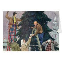 Family Stringing Lights on the Christmas Tree Greeting Cards