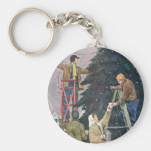 Family Stringing Lights on the Christmas Tree Keychains