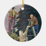 Family Stringing Lights on the Christmas Tree Ornament