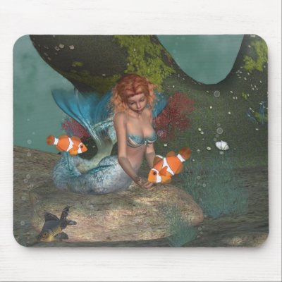 Feeding the fishies Mermaid Mousepad by rockets