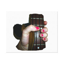 Female hand holding four string bass neck canvas prints