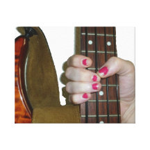 female hand holding four string bass neck stretched canvas prints