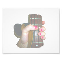 female hand holding four string bass neck faded photograph
