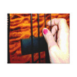 female hand pulling bass string 1 posterized canvas print