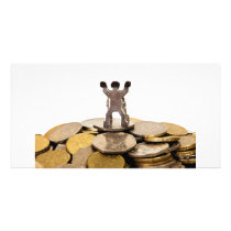 Figurine on top of a pile of coins personalized photo card