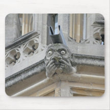 Fingers-up-nose gargoyle mousemat