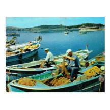 Fishermen sorting their nets post card