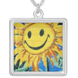 fleurs heureuses jaunes de tournesol de visage colliers