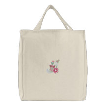 Fleurs mignonnes et un sac fourre-tout brodé par p