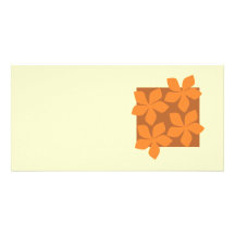 Fleurs oranges tropicales sur la crème carte avec photo