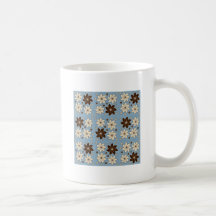 Floral design on blue coffee mugs