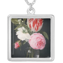 Flowers in a glass vase necklaces