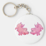Flying pigs in love! key chains