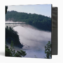 Fog drifts under the Deception Pass bridge at Binder