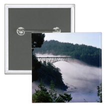 Fog drifts under the Deception Pass bridge at Pinback Button