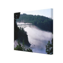 Fog drifts under the Deception Pass bridge at Stretched Canvas Prints
