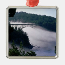Fog drifts under the Deception Pass bridge at Ornament
