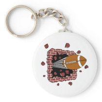 Football Through A Wall keychains