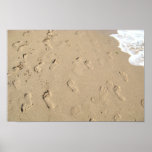 Footsteps on sand posters