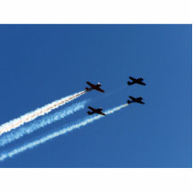 four flying planes with trails blue sky cut outs