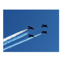four flying planes with trails blue sky postcard